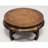 A GOOD CHINESE CIRCULAR LOW HARDWOOD AND BURR WOOD INLAID TABLE, with a carved frieze on five