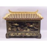 A 19TH CENTURY LACQUER PAGODA FORM CASKET AND COVER, the casket painted with gilt landscape scenes