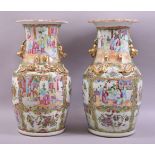 A PAIR OF CHINESE CANTON PORCELAIN VASES, decorated with panels of figures and native flora, the