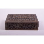 A 19TH CENTURY INDIAN CARVED WOODEN SPICE BOX, 13.5cm x 11cm.
