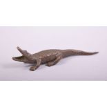 A SMALL JAPANESE BRONZE MODEL OF AN ALLIGATOR, 8.5cm long.