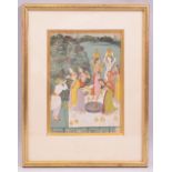 AN 18TH/19TH CENTURY RAJASTHAN INDIAN PAINTING ON PAPER, depicting a rajput warrior being offered