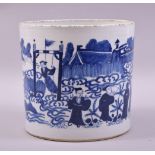AN EARLY 20TH CENTURY CHINESE BLUE AND WHITE PORCELAIN BRUSH POT, painted with various figures in
