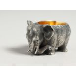 A CAST RUSIAN SILVER ELEPHANT SALT with gilt interior. Mark 84. 1.75ins long.