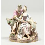 A GOOD LARGE MEISSEN PORCELAIN GROUP OF LOVERS, a lamb by her side holding a staff, the man's hat