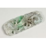 A CARVED JADE PENDANT