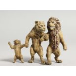 A PAINTED COLDCAST BRONZE LION FAMILY. 3ins