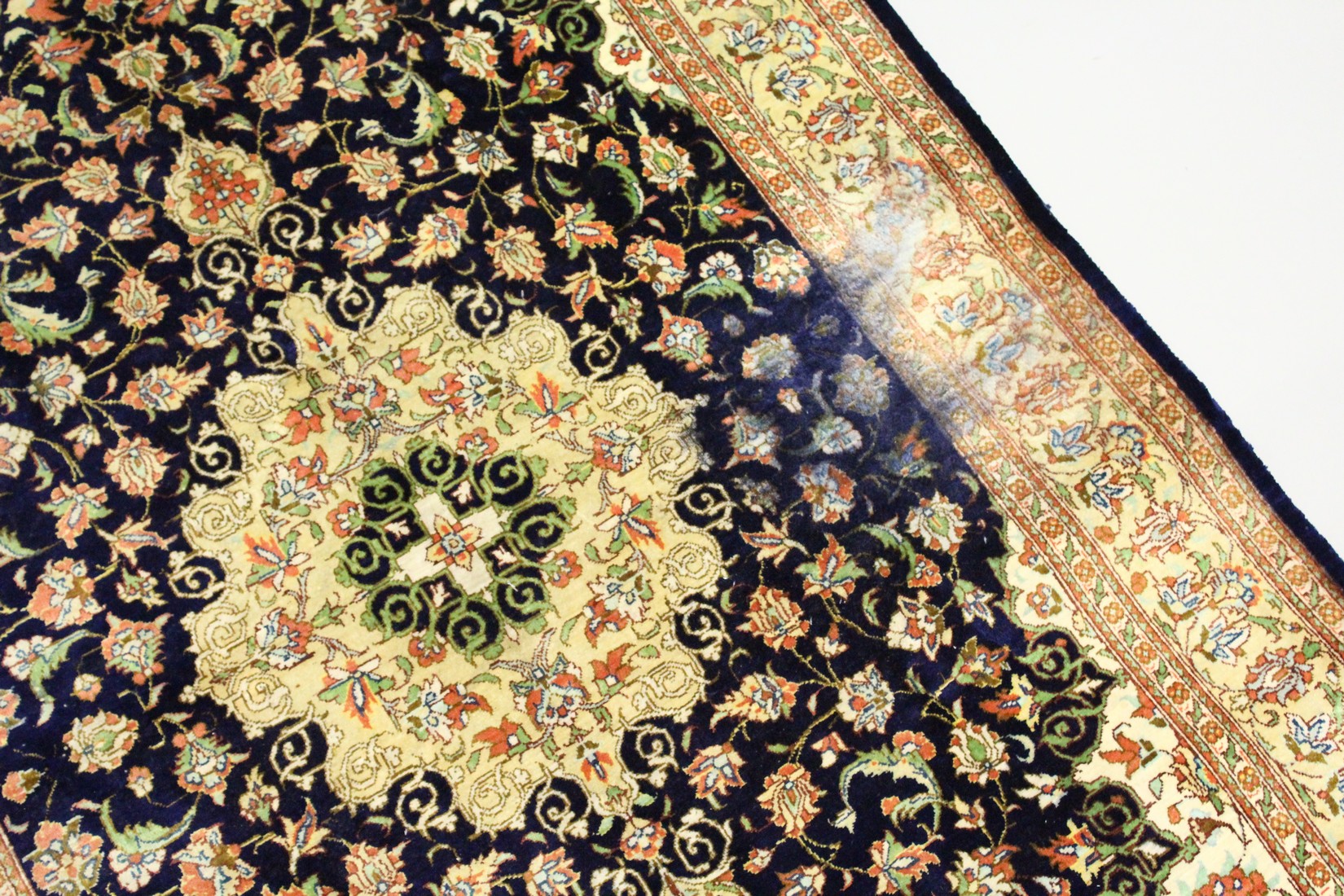 A PERSIAN SILK QUOM RUG, blue ground with all over floral decoration. 4ft 10ins x 3ft 1ins. - Image 2 of 6