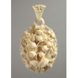 A 19TH CENTURY EUROPEAN IVORY LOCKET, 2.25ins x 2ins, carved with lily of the valley and other