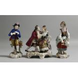 A PAIR OF SAMSON FIGURES OF A GARDENER AND A LADY with watering can. 6ins high, and a group, GALLANT