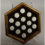 A FRAMED COLLECTION OF FOURTEEN PLASTER MEDALLIONS, Francois I, Van Dych, etc..