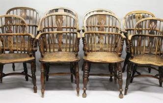 EIGHT 19TH CENTURY ASH, BEECH AND ELM LOW BACK WINDSOR ARMCHAIRS.
