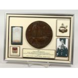 A FRAMED AND GLAZED WW1 BRONZE MEMORIAL DEATH PLAQUE or "Dead Man's Penny" 36967. Private James