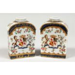 A PAIR OF SAMSON OF PARIS ARMORIAL TEA CADDIES 4.25ins high.