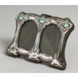A MINIATURE SILVER DOUBLE PHOTOGRAPH FRAME 3ins x 4ins