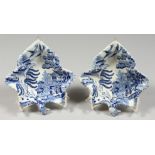 A PAIR OF STAFFORDSHIRE BLUE AND WHITE LEAF SHAPED PICKLE DISHES 5ins.