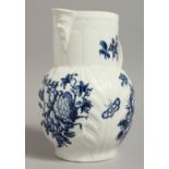 AN 18TH CENTURY WORCESTER MASK JUG with cabbage leaf moulding decorated with the Natural Sprays