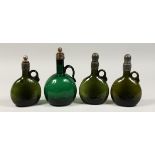FOUR EARLY COLOURED GLASS FLAGONS / DECANTERS and stoppers. 7.5ins & 8.5ins tall.
