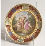 A SUPERB 19TH CENTURY VIENNA CIRCULAR PLATE, with high quality painting and gilding, the centre