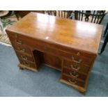 A GEORGE III DESIGN MAHOGANY KNEEHOLE DESK with a writing slide, long drawer over a kneehole,