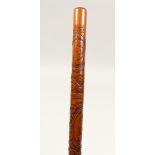 A GOOD FOLK ART WALKING STICK DATED 1891, with eagle, flag etc.. 35ins long.