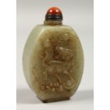 A CHINESE CARVED JADE SNUFF BOTTLE, 2.5ins.