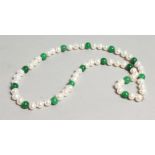 A STING OF PEARL AND JADE NECKLACE.