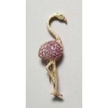 AN 18CT.WHITE AND YELLOW GOLD TULIP FLAMINGO set with pink sapphires and diamonds