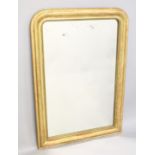 A VICTORIAN GILDED WALL MIRROR 2ft x 4ft.