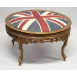 A CIRCULAR STOOL with union jack top. 2ft 9ins diameter.