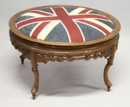 A CIRCULAR STOOL with union jack top. 2ft 9ins diameter.