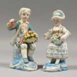 A SMALL PAIR OF DERBY FIGURES OF A BOY AND GIRL, carrying baskets of fruit and flowers. 5ins high.