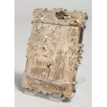 A VICTORIAN AMERICAN SILVER CALLING CARD CASE depicting a cathedral in high relief. 3.25ins x 2.2