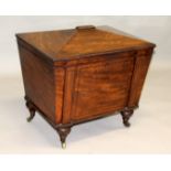 A 19TH CENTURY MAHOGANY SARCOPHAGUS SHAPED CELLARETTE, the interior fitted for six bottles,
