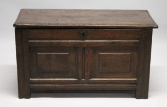 AN 18TH CENTURY OAK COFFER, with plain top, the front with two fielded panels. 3ft 4ins long x 1ft