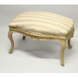 A GILT FRAMED WINDOW SEAT with floral cover