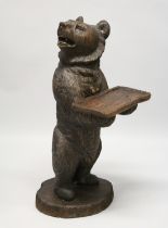 A VERY GOOD 19TH CENTURY BLACK FOREST CARVED WOOD BEAR holding a tray, 3ft 3ins high, it's head to