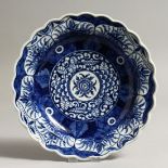 A WORCESTER PLATE painted with the Kang His lotus pattern.