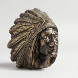 A BRONZED RED INDIAN HEAD CAR MASCOT. 3.75ins high.