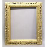 A GILT PIERCED FRAME 2ft x 2ft 4ins.