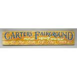 A LONG PAINTED CARTERS FAIRGROUND SIGN, 7ft long.