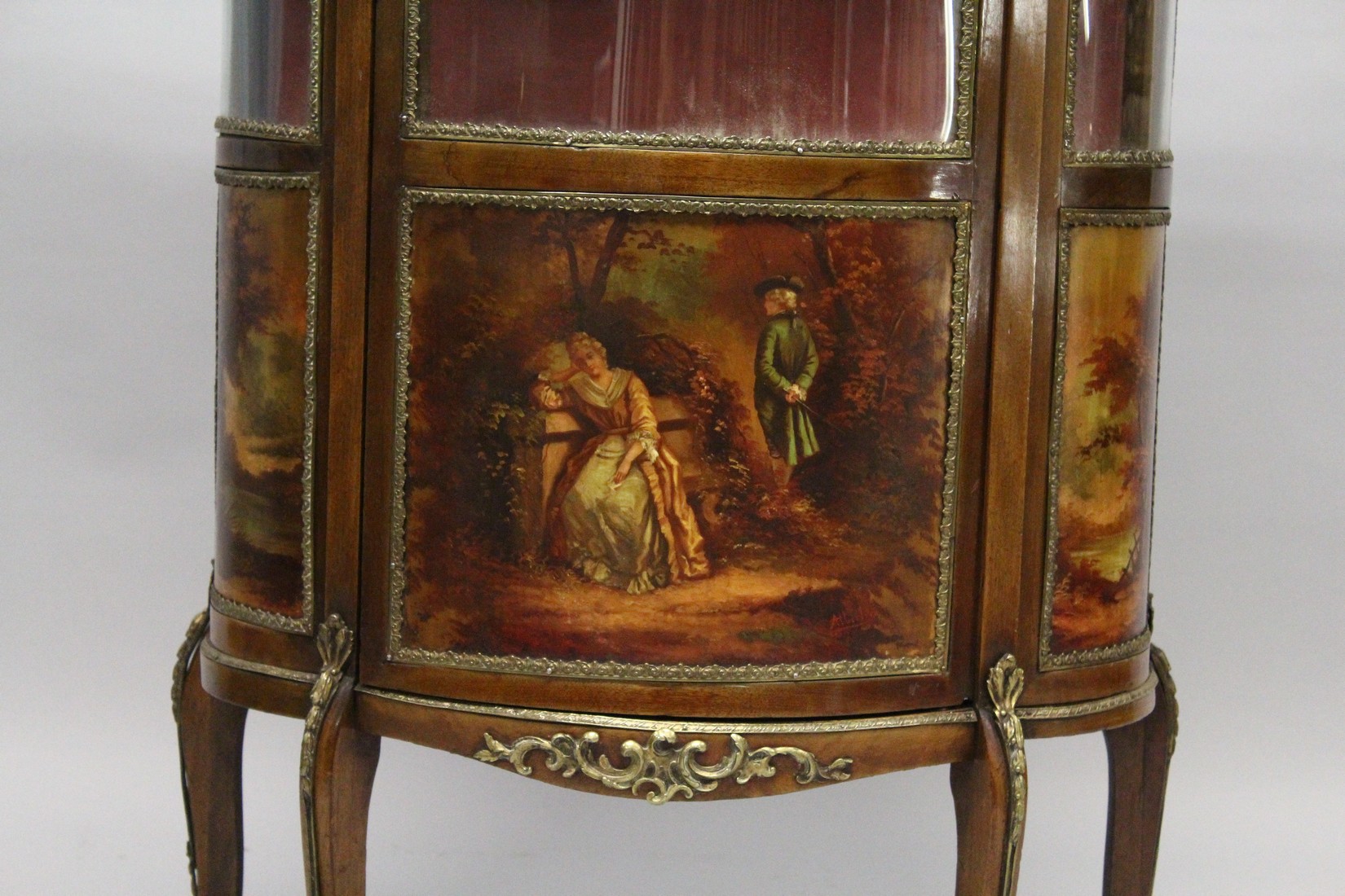 A VICTORIAN LOUIS XV STYLE BOW FRONTED VITRINE with ornate mounts, 3/4 glass doors and sides with - Image 2 of 8