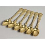 A SET OF SIX VICTORIAN SILVER GILT STAG PATTERN TEA SPOONS. London 1868. Maker George Adams.