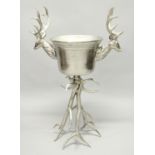 A LARGE STAG WINE COOLER on a stand. 42ins high.