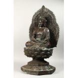 A LARGE CHINESE IRON BUDDAH on a lotus leaf stand, 36ins high.