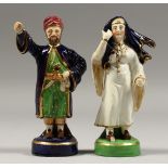 A SMALL PAIR OF DERBY TURKISH FIGURES. 5.5ins high, (AF).