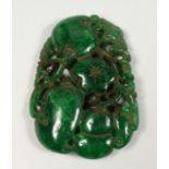 A CHINESE LARGE PIERCED JADE PENDANT, 3ins