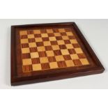 A SQUARE INLAID CHESS BOARD. 11ins