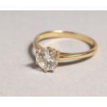 A GOOD 18CT GOLD SOLITAIRE DIAMOND RING.