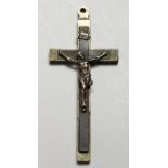 A SMALL CRUCIFIX. 4.25ins long.